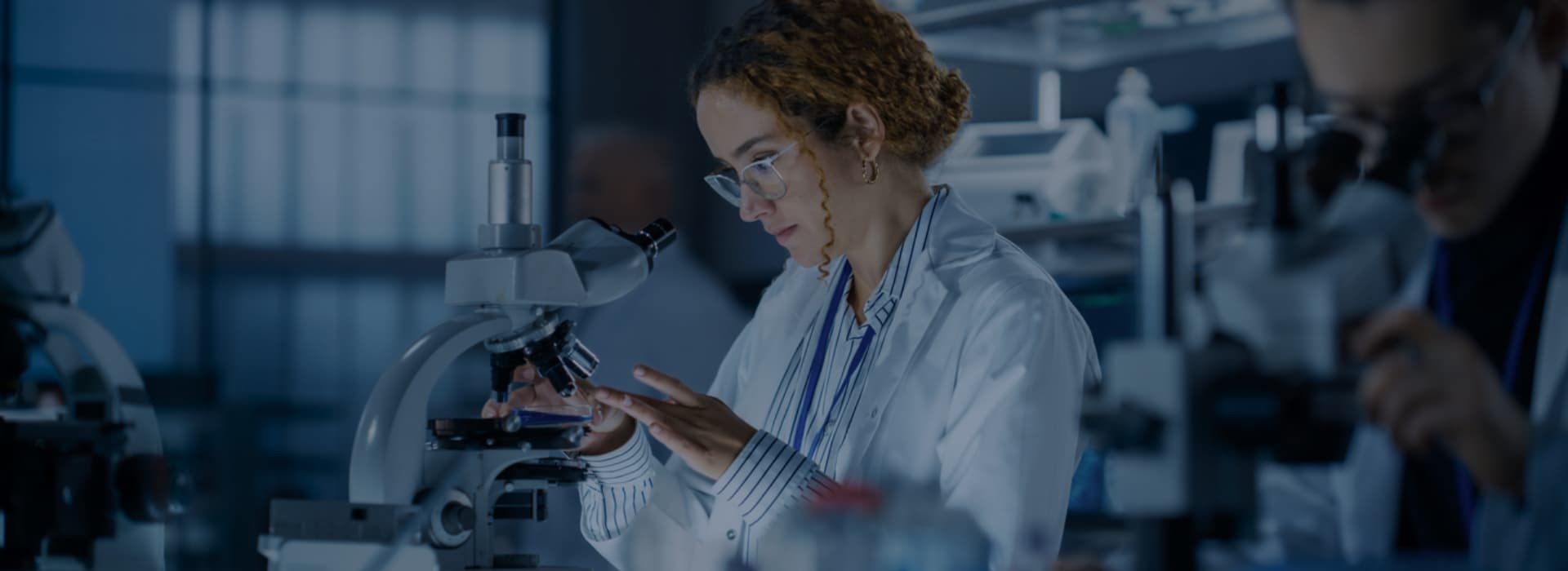 Scientist at a microscope