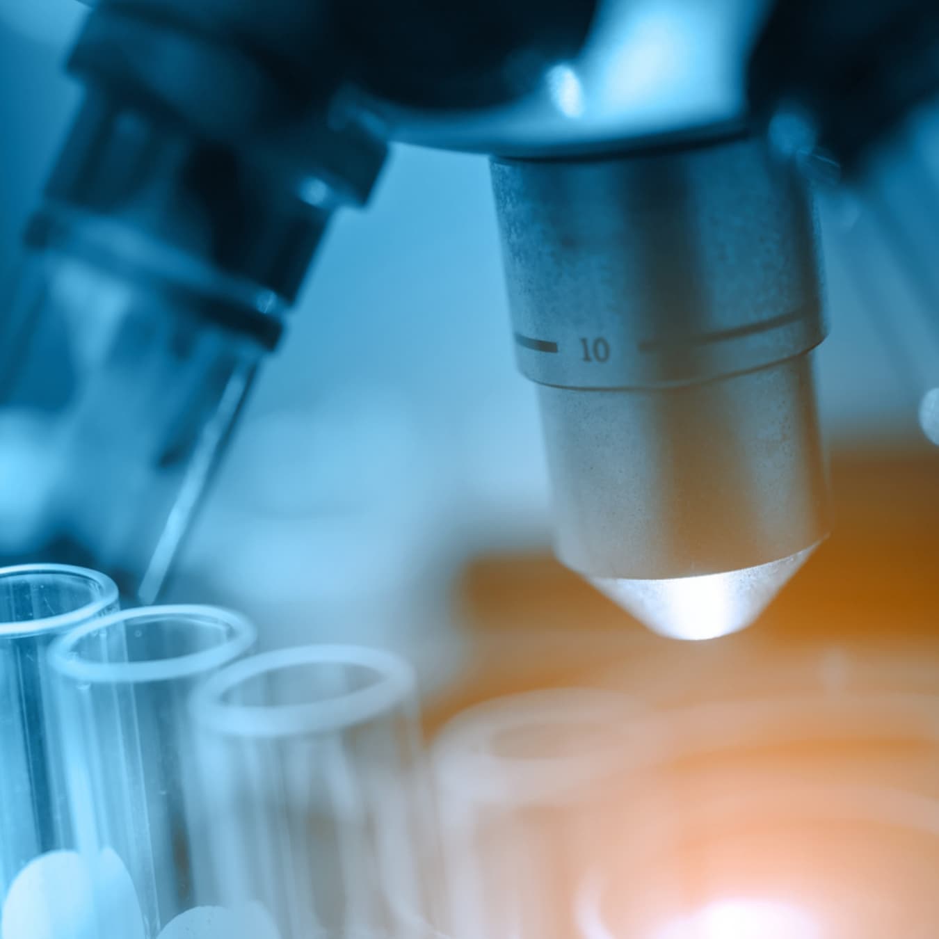 Scientist at a microscope